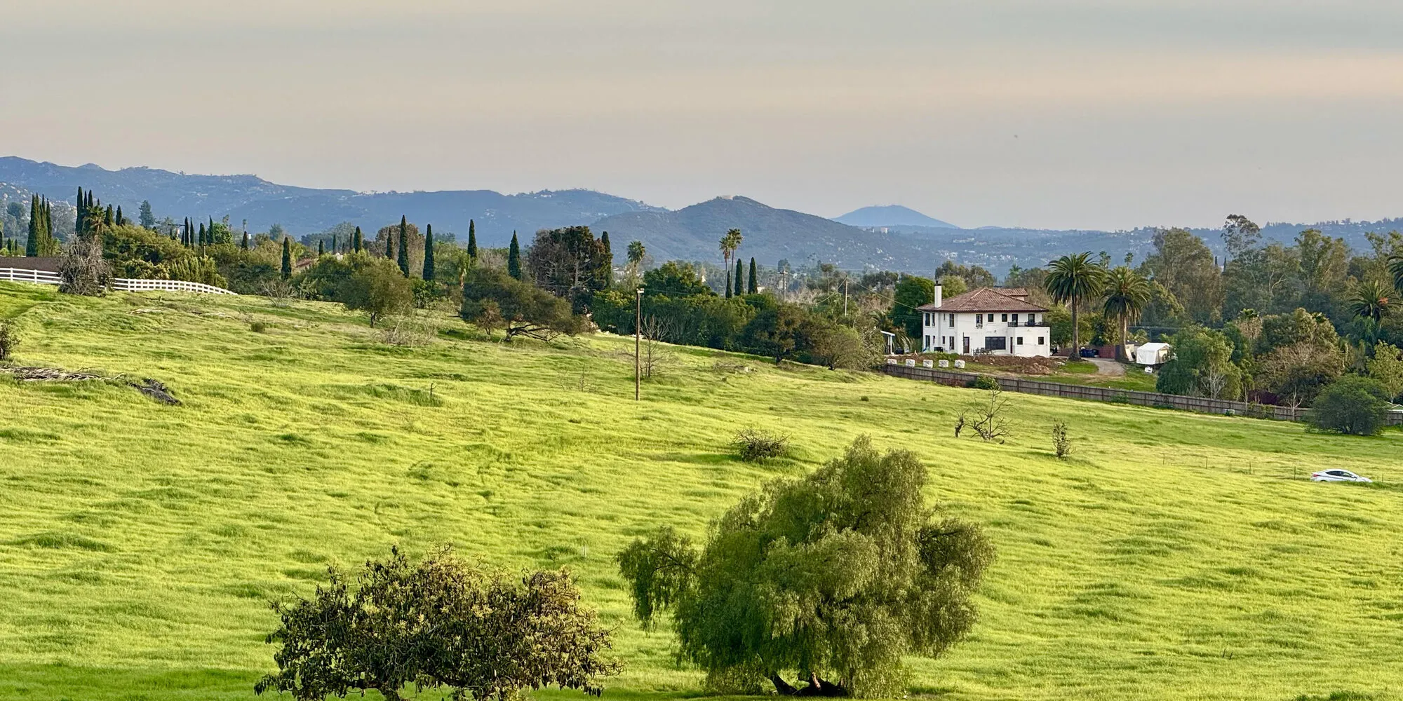 Wide view across the rural valley of unincorporated Escondido toward the surrounding hills.